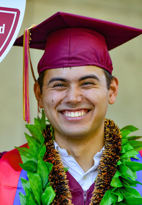 smiling male grad