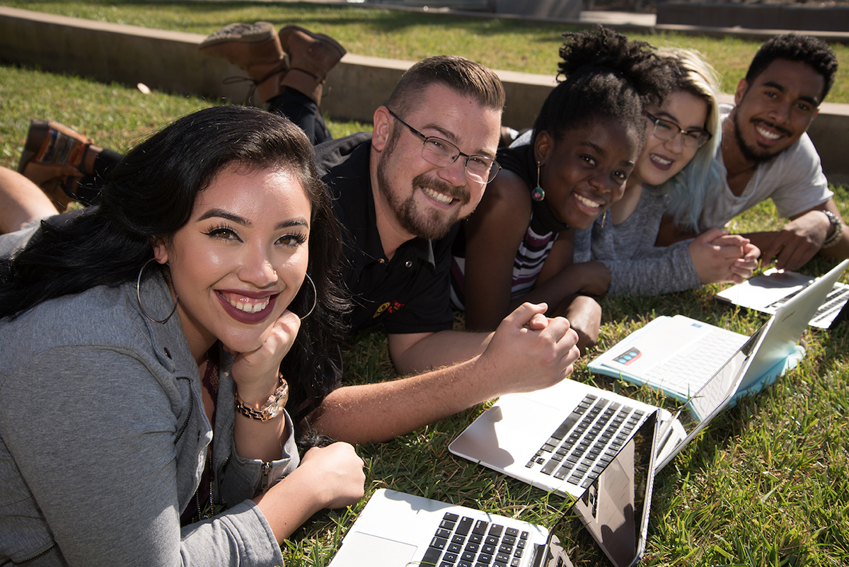 students with laptops