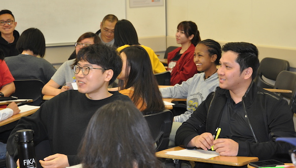 students smiling in classroom