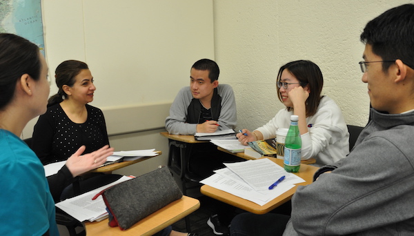 students talking in class