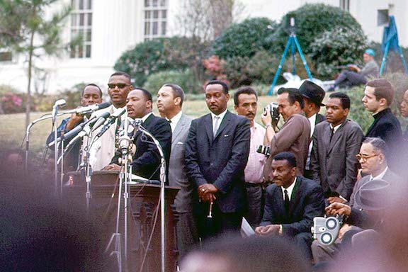 Martin Luther King Jr and other speakers in Montgomery, Alabama