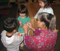 Corinne with children