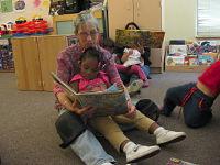 corrine reading to toddler