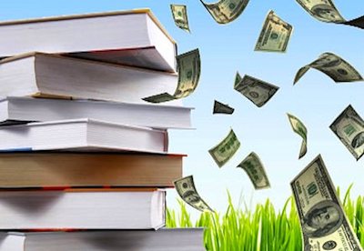 stack of books with dollars