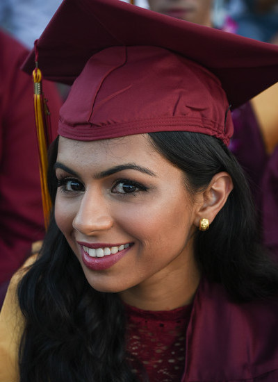 smiling young woman grad