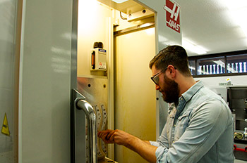 student using haas machine