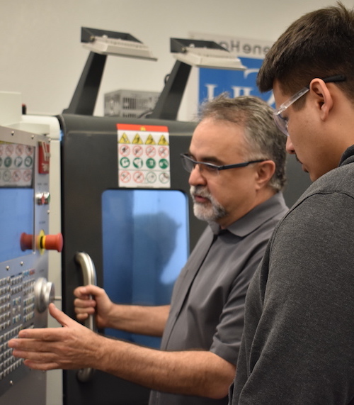 Instructor Mike Appio with student