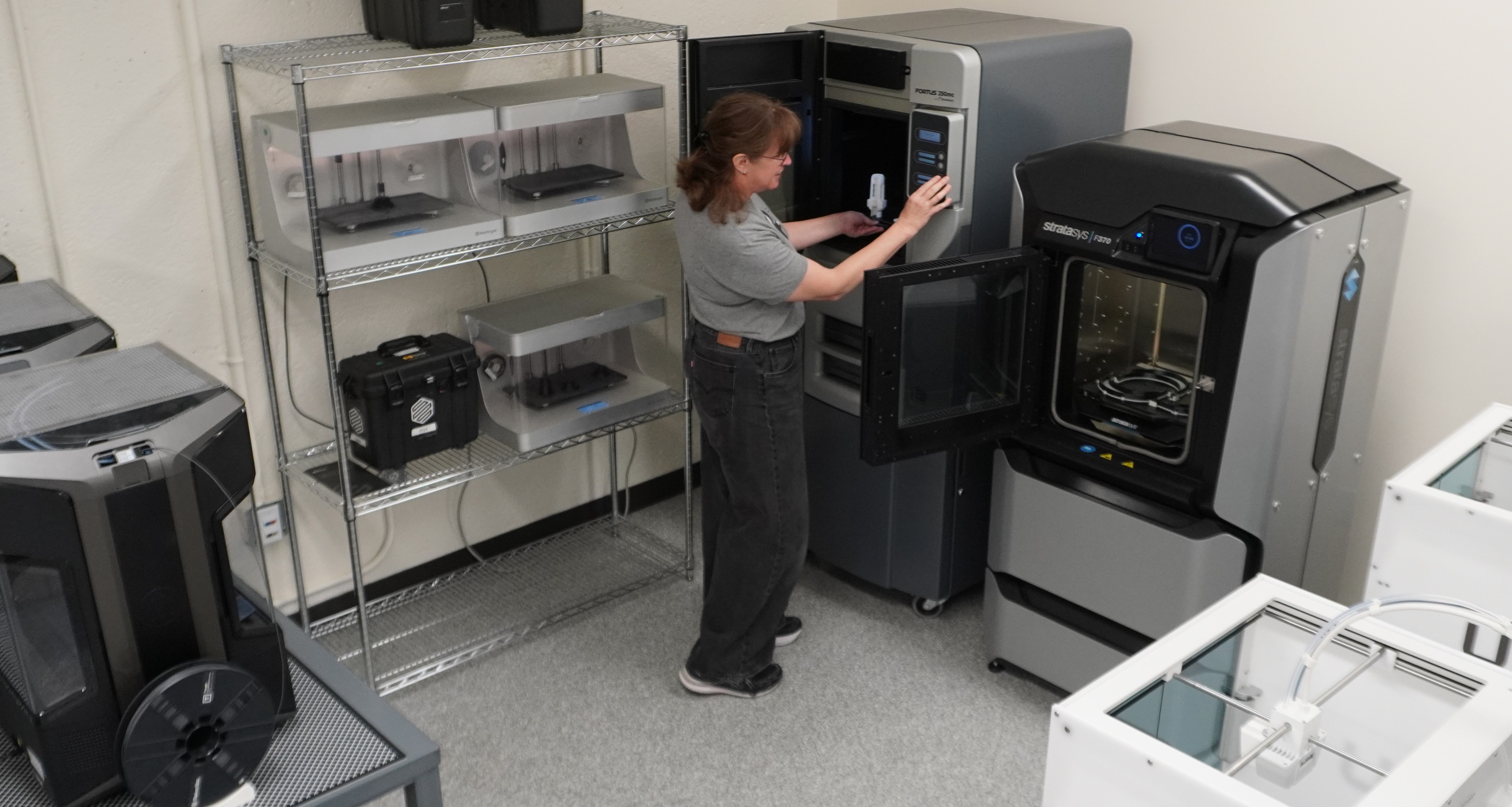Female student in E35 3D printing lab