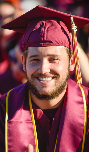 smiling male graduate