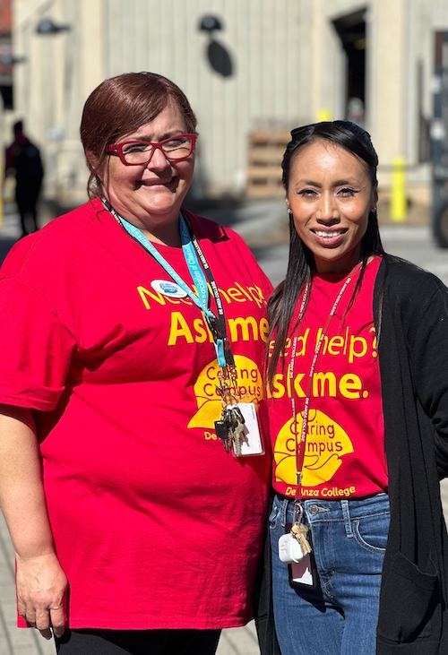 two women in red t-shirts