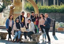 students near fountain