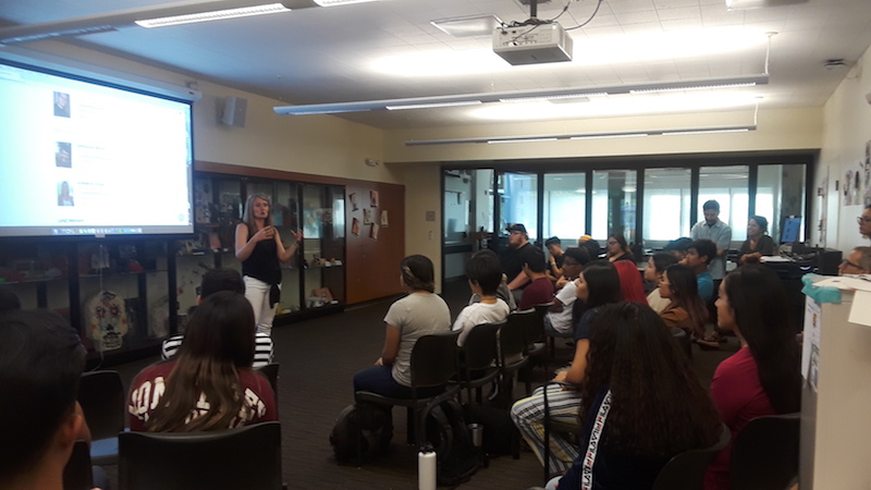 instructor talking with students