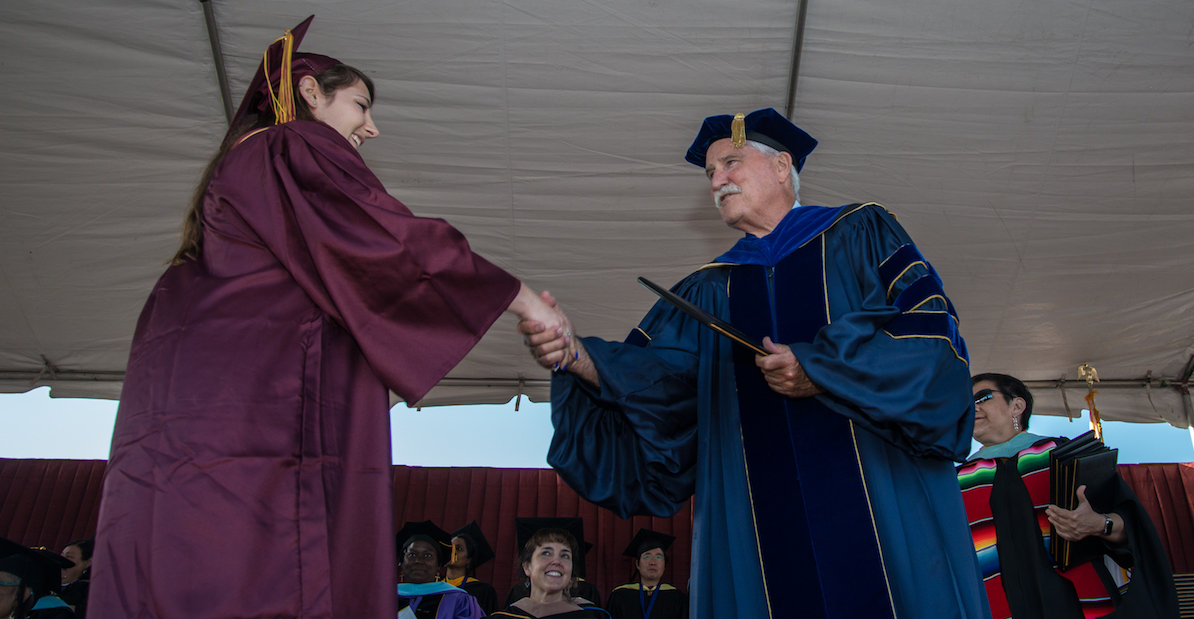 President Murphy with graduate