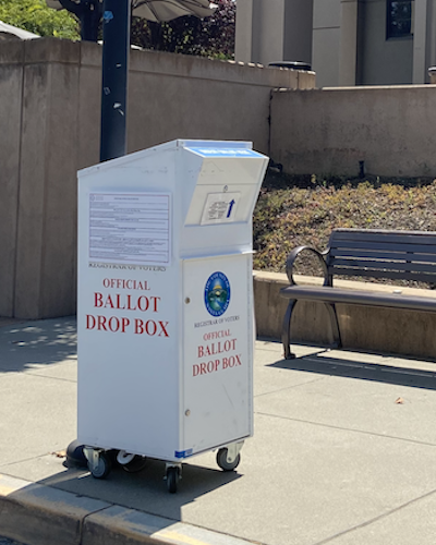 It's easy to mail in your ballot or drop it off. There's an official Drop Box on the De Anza campus – on the sidewalk outside the Registration and Student Services Building entrance that faces Stevens Creek Boulevard. 