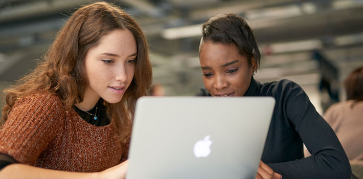 students at laptop