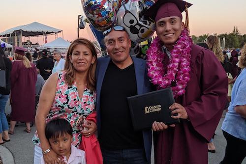 grad with family