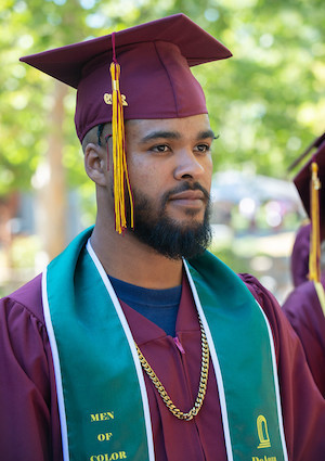 grad with Men of Color sash