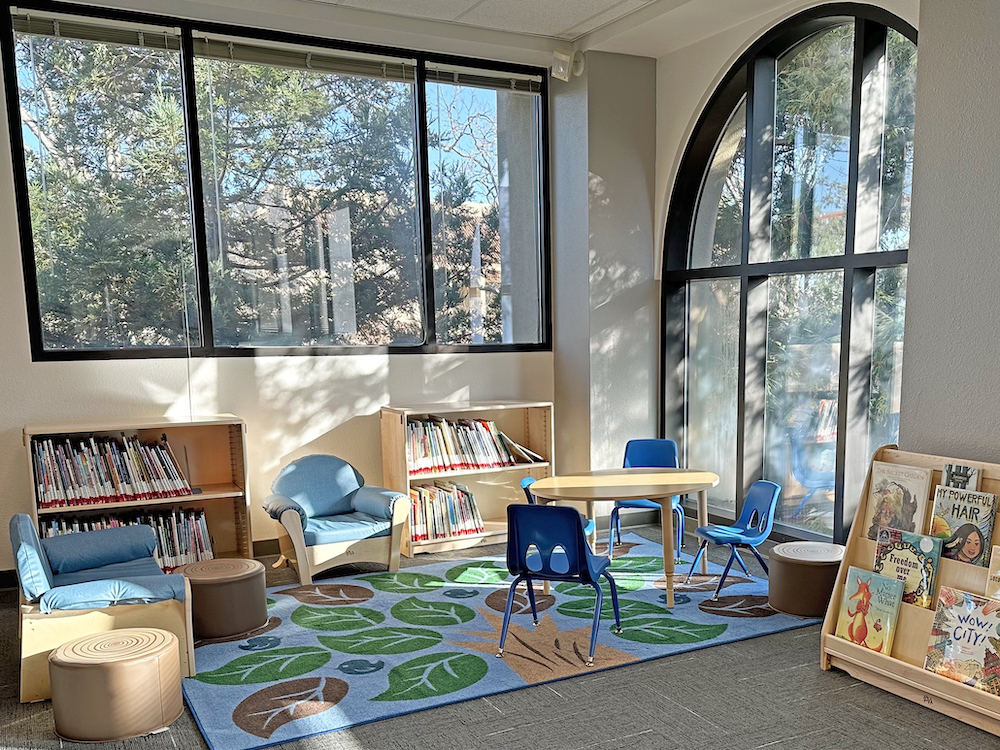 kids furniture on rug near sunny window