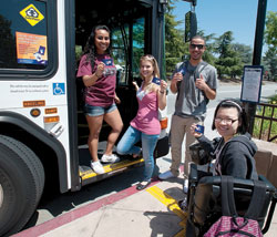 students at bus stop