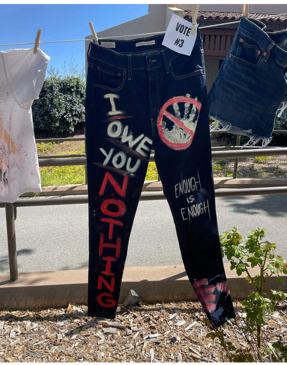 jeans hanging from a clothesline