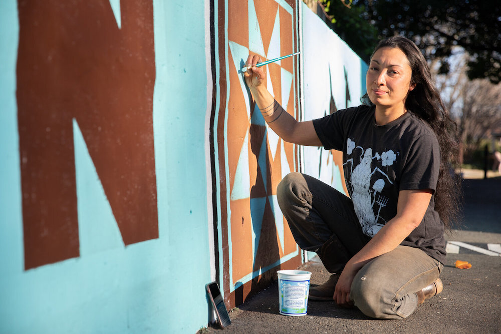 Meesha Goldberg: woman painting mural